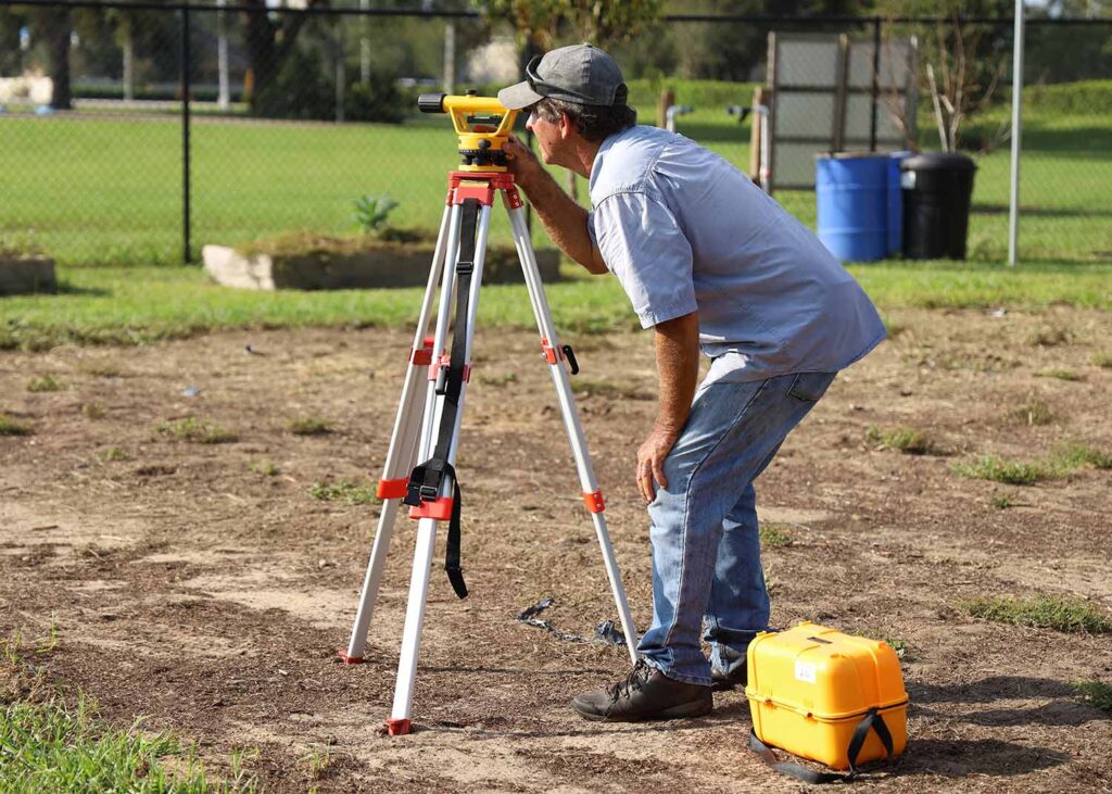 A land surveyor in the field