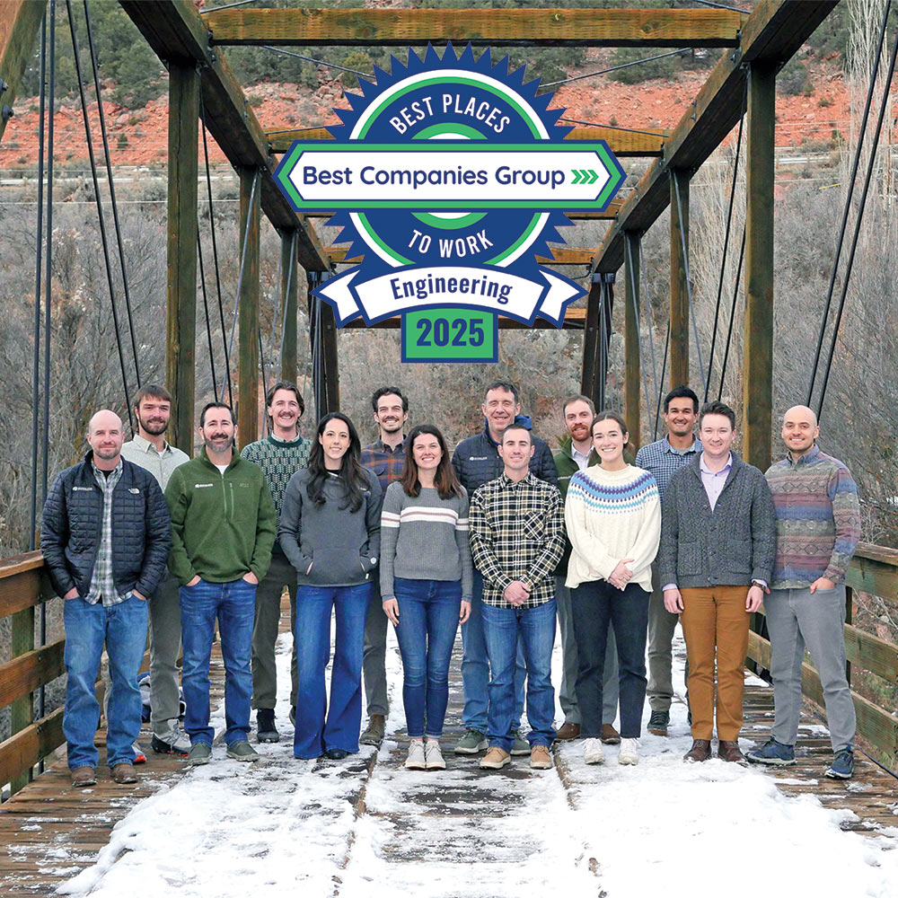 Roaring Fork Engineering team standing on a bridge